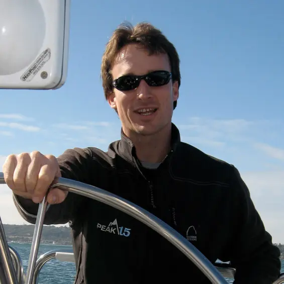 James O'Leonard driving a boat